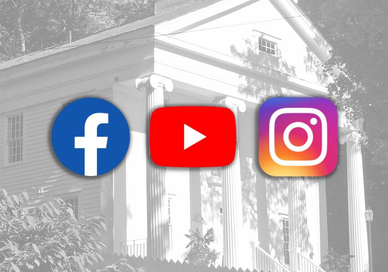 Facebook, YouTube and Instagram logos superimposed over a black and white image of the Spencertown Academy